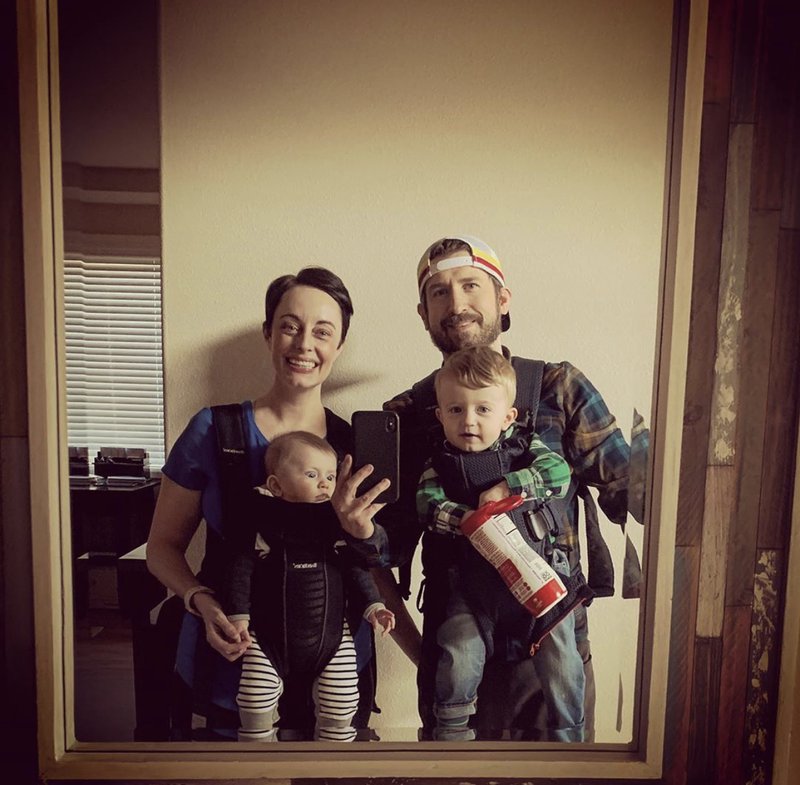 Lucas and his wife and two sons